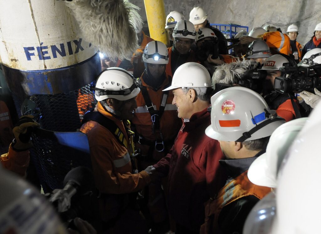 First rescuer, Manuel_González, preparing to enter the capsule for the 2,000 ft descent to the trapped mines at San Jose Mine, Copiapo, Chile.
Author: Gobierno de Chile